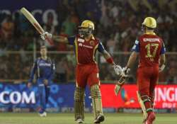 ipl 8 kohli starc guide rcb to nine wicket win over rr