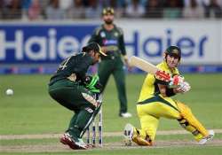 pak vs aus smith warner hit 50s to guide australia to 231 9