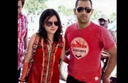 dhoni plans a reception in delhi gets designer clothes