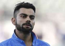 kohli s pakistani fan faces 10 year jail for hoisting tri colour