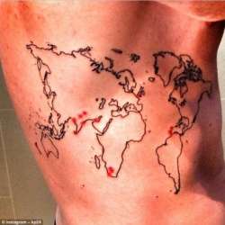 kevin pietersen inks body with a world map