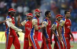 kohli gayle lead rcb to 26 run win over pune