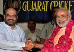 narendra modi s close aide amit shah set for bcci top post