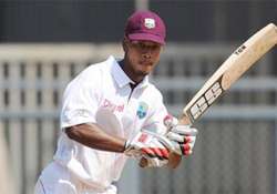 powell strikes ton as west indies a take lead