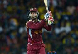 samuels shines as west indies beats bangladesh