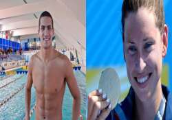 anderson mellouli win first golds at swimming worlds