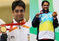 cwg 2014 bindra clinches gold malaika wins silver in shooting