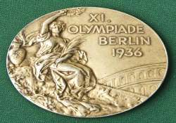 difficult for ioc to accept owens medal auction