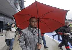 hamilton fastest in wet british gp practice