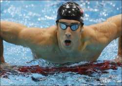 michael phelps sets tone for rio race with blistering 200m butterfly win