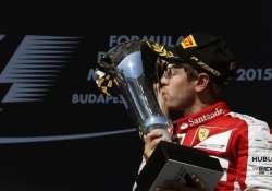 sebastian vettel wins action packed hungarian grand prix ahead of red bulls