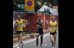 harminder wins bronze in men s 20km walk event