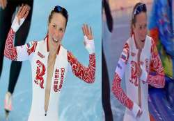 russian speedskater olga graf unzips her skin suit after winning a medal