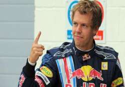 vettel dominates practice tops the timings on day one