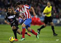 atletico beats sevilla 2 1 in 1st copa semifinal