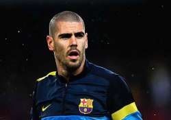 barcelona s injured goalkeeper valdes to have surgery on monday.