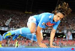 cavani hat trick leads napoli over ac milan