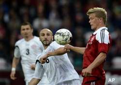 denmark beat georgia 2 1 with last minute goal