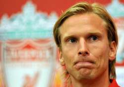 evian signs christian poulsen from liverpool