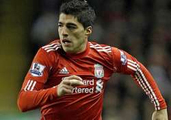 fa charges suarez for racially abusing evra