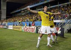 fifa world cup colombia tops group c by beating japan 4 1