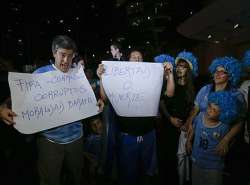 fifa world cup uruguayan soccer fans wait for banned suarez