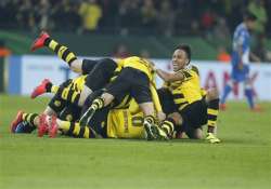 wolfsburg dortmund advance to german cup semifinals