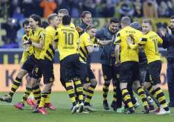 dortmund overpowers schalke 3 0 in german bundesliga