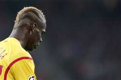 italy coach conte plays down dropping balotelli