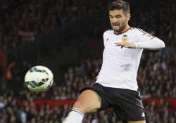 valencia beats lowly granada 4 0 in spanish league