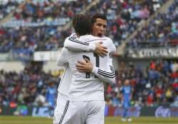 madrid beats sevilla 2 1 to increase spanish league lead