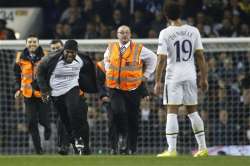 europa league game halted after 3 pitch invasions