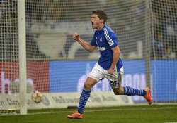 bundesliga huntelaar hits hat trick for schalke bayern wins