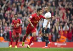 liverpool beats spurs 4 0 tops premier league