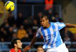 malaga draws 1 1 with osasuna in spain