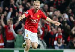 man united midfielder paul scholes retires