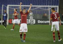 roma beats inter milan in 1st leg of italian cup semi