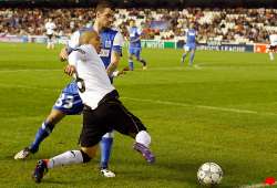 valencia routs genk 7 0 to set up chelsea clash