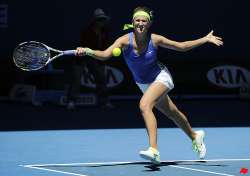 azarenka breezes through center court opener