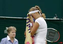 defending champion kvitova exits wimbledon