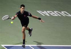 djokovic wins del potro retires in dubai