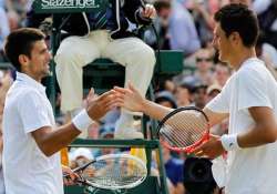 djokovic beats tomic to reach wimbledon semifinals