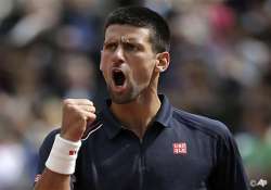 djokovic rallies from 2 sets down