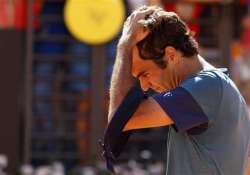 federer beaten in return after boys birth in rome