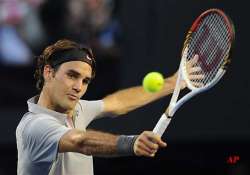 federer advances to 3rd round at australian open