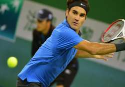 federer survives scare to enter shanghai quarters