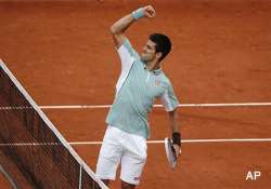 french open djokovic beats goffin in 1st round