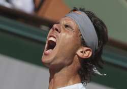 french open nadal outlasts djokovic