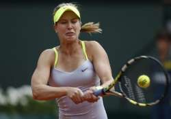 french open sharapova wraps up rain delayed victory