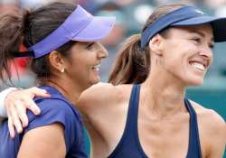 sania martina cruise into second round at wimbledon